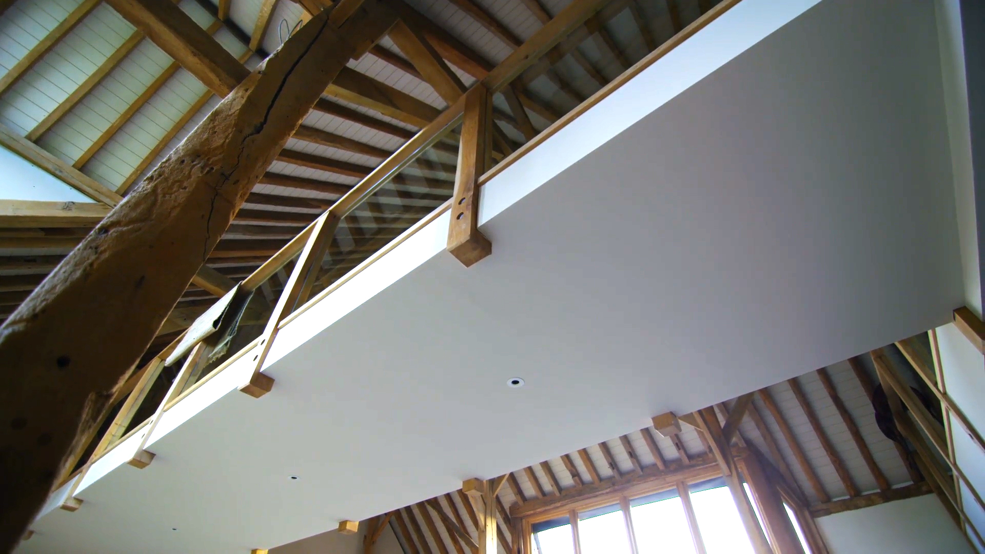 Inside a barn conversion shoing the timberwork