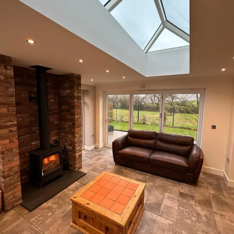 a modern extension with log burner and sliding doors